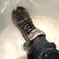 Macbeth hightops and jeans soaked